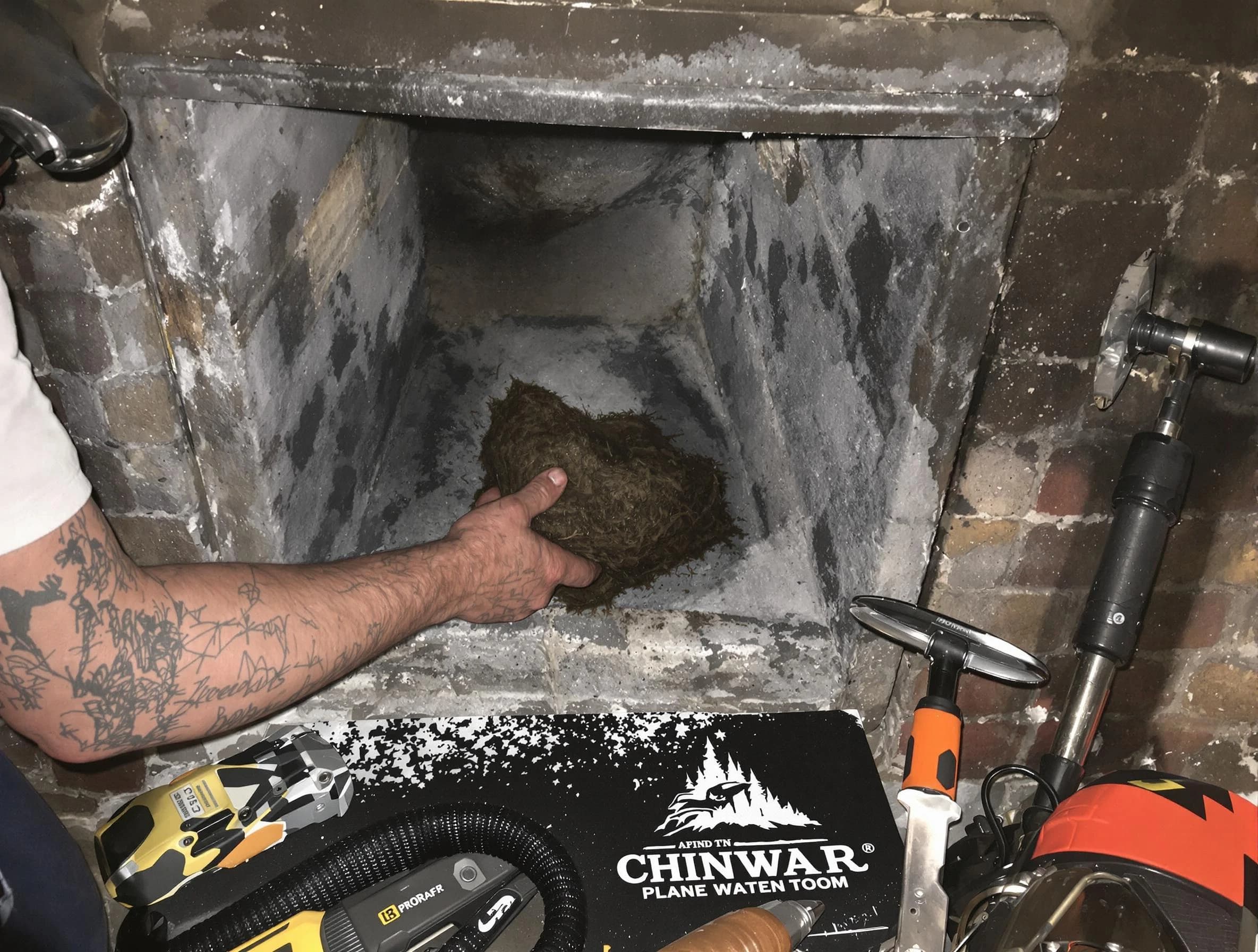 Irondale Chimney Sweep safely removing debris and screening chimney in Irondale, AL